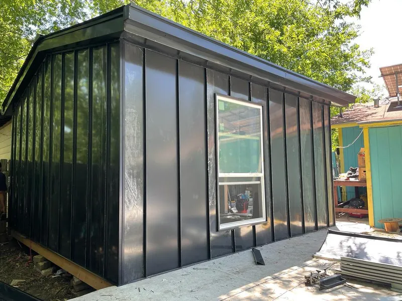 Black standing seam metal wall panels for Roof Inspection in Kronenwetter