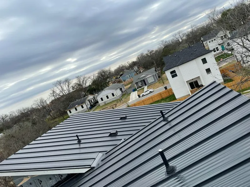 Standing seam metal roof panels with vents for Skylight Repair in Kronenwetter